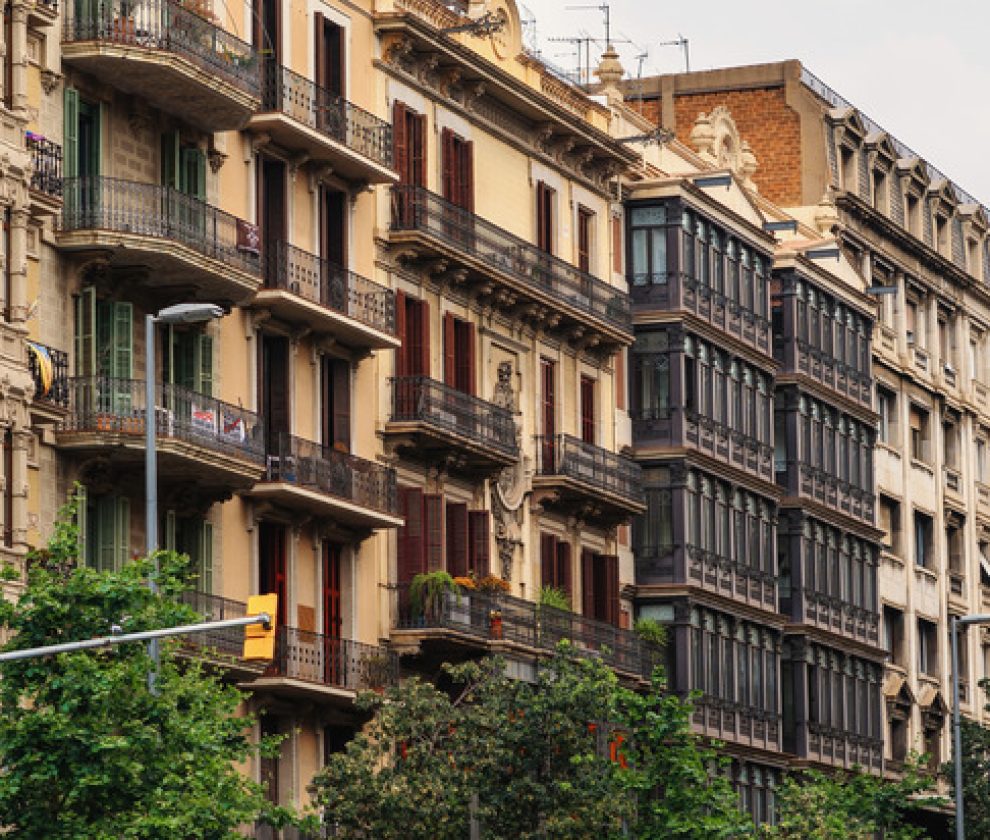 Row of old buildings made in classic style in Barcelona